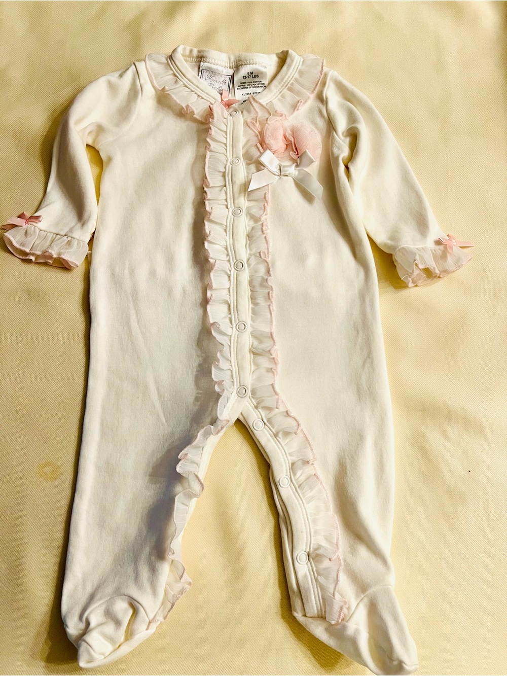 Cream Footed One-Piece with Pink Ruffle Trim